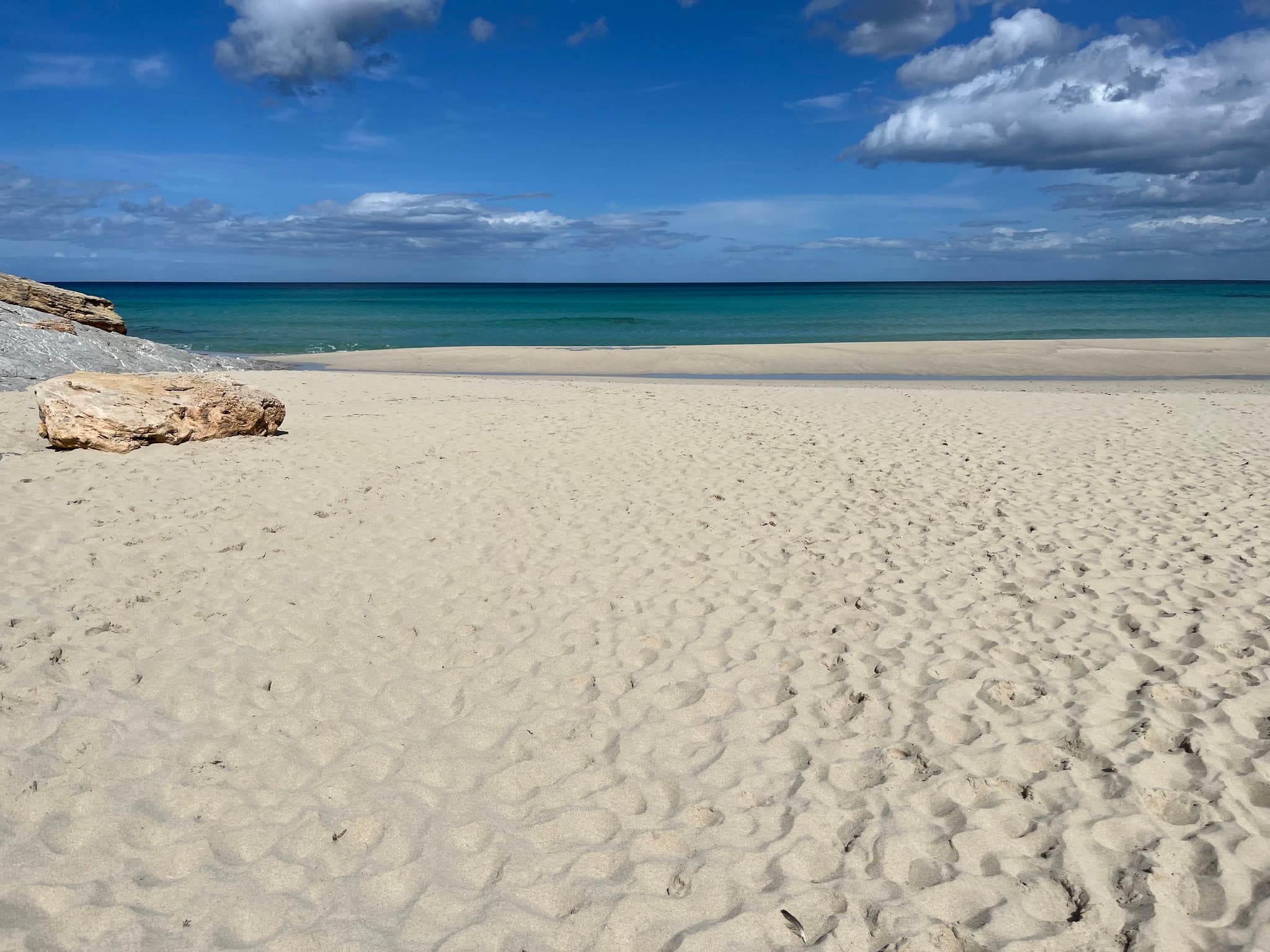 Beach with rocks by the sea